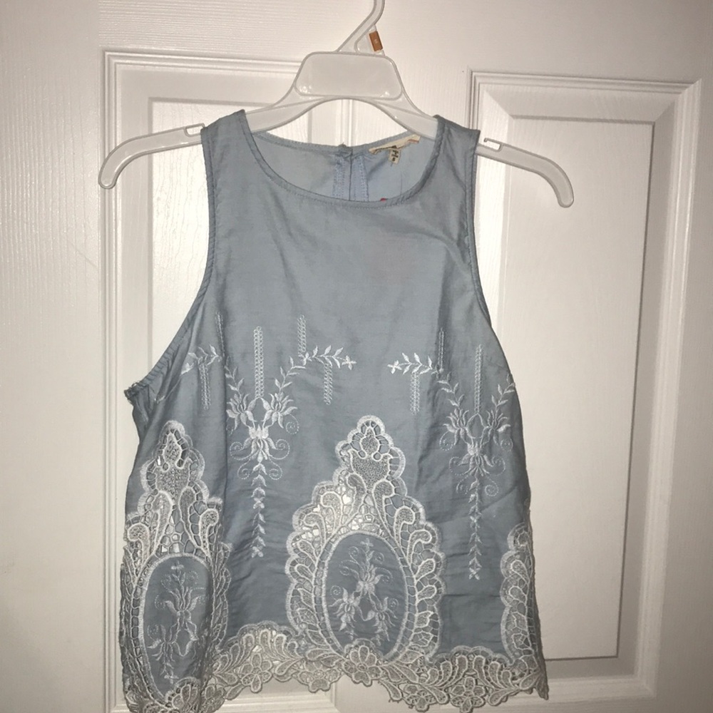 Knit top with embroidering